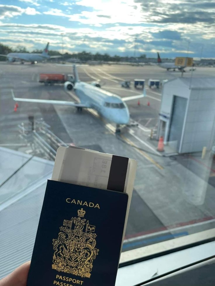 Canadian passport and travel documents photographed during a journey